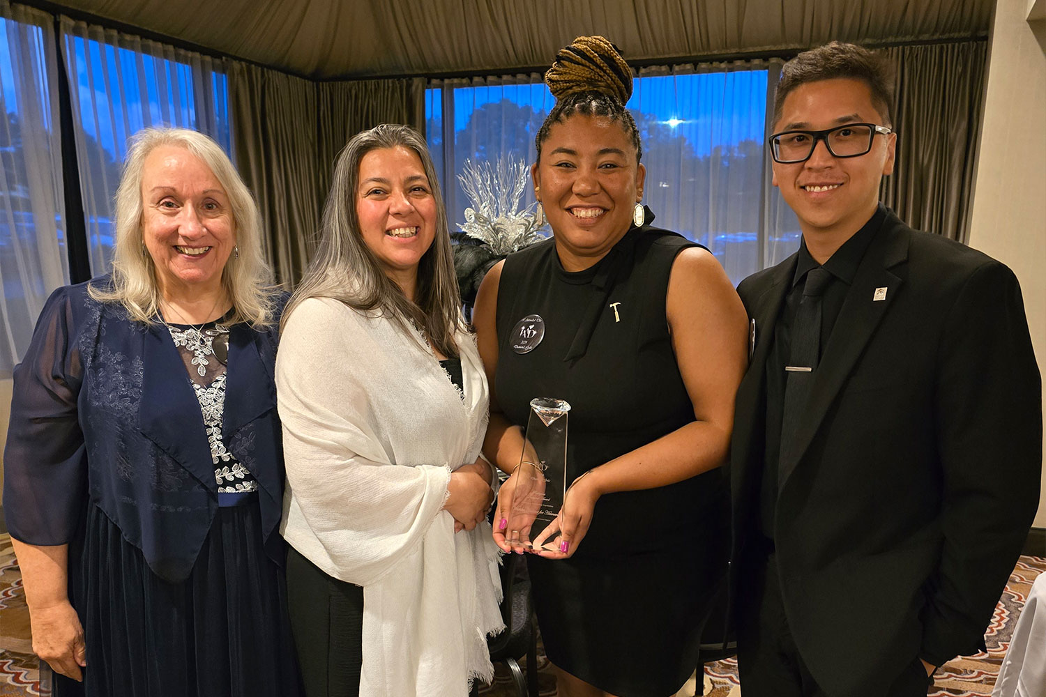 Members of Wichita Habitat team holding the Diamond Award.