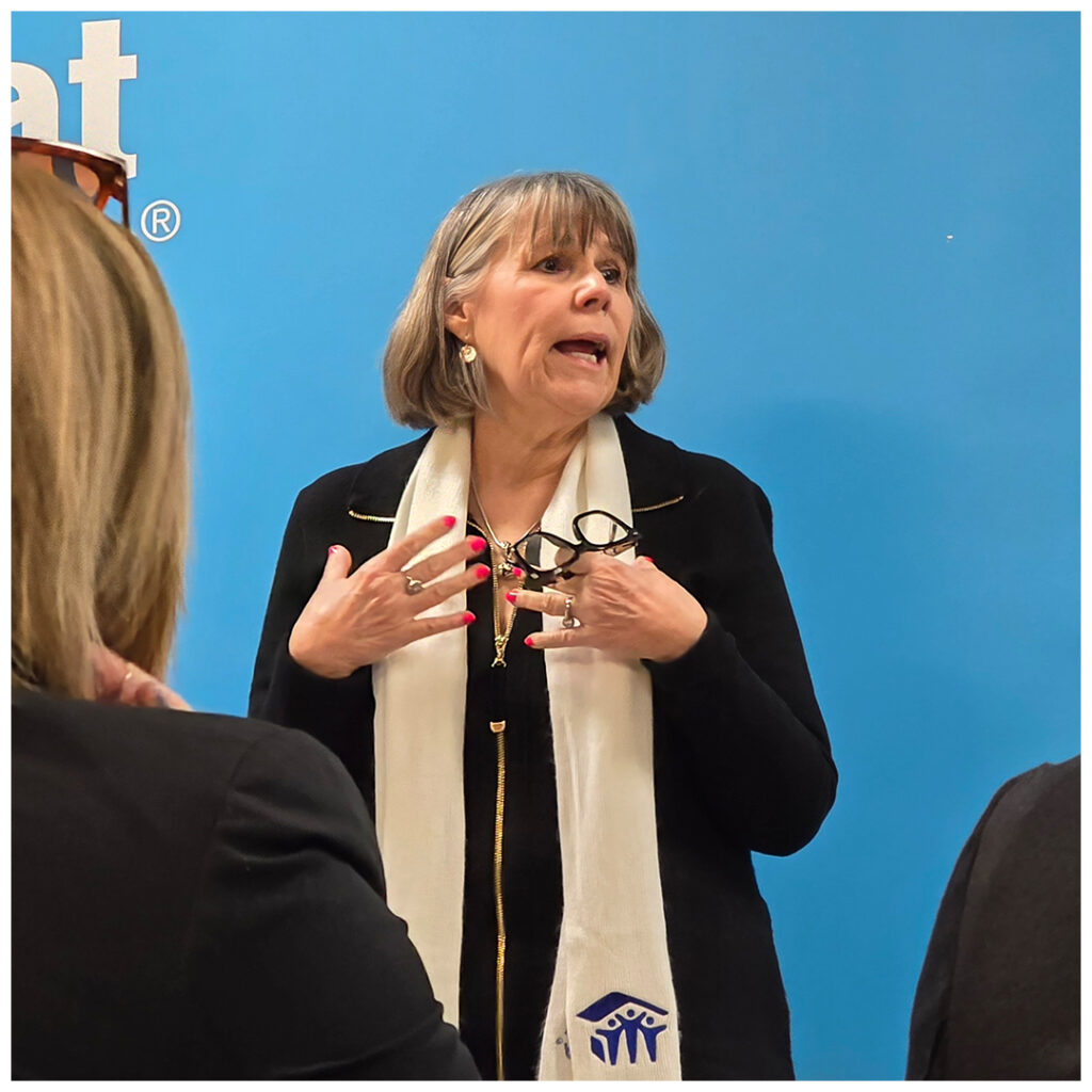 Ann Patterson speaking to Habitat representatives.