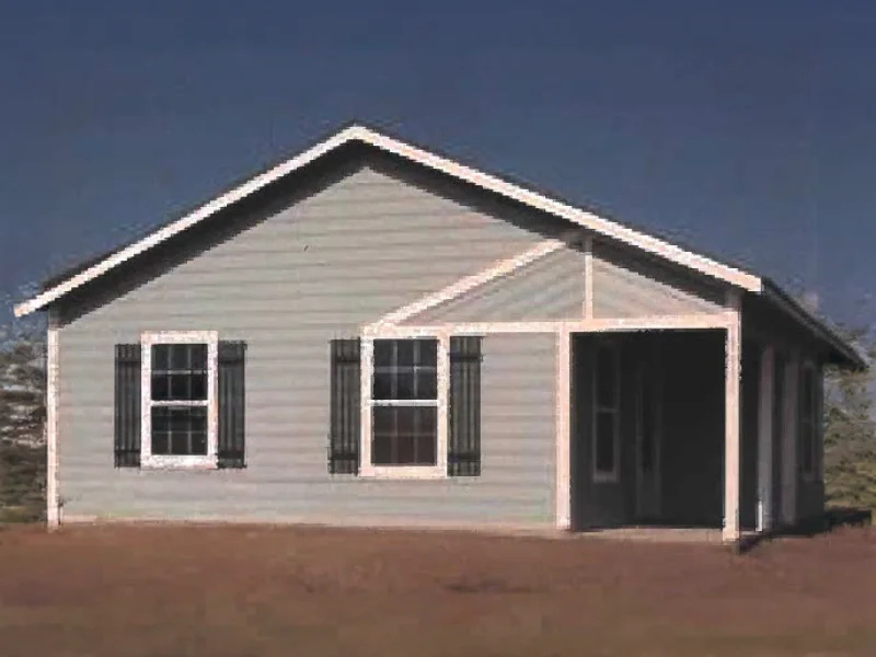 A small, single-story gray house.