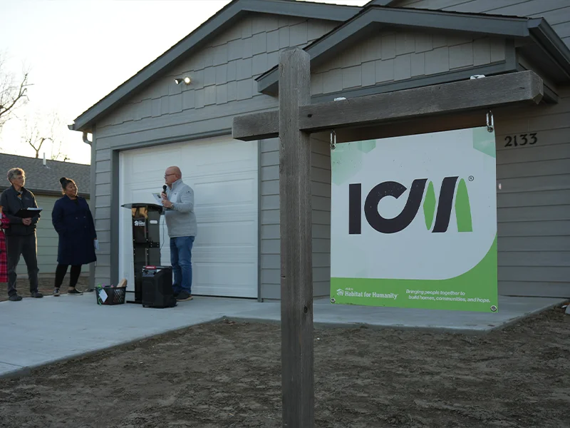 An ICM sign posted in front of a home.
