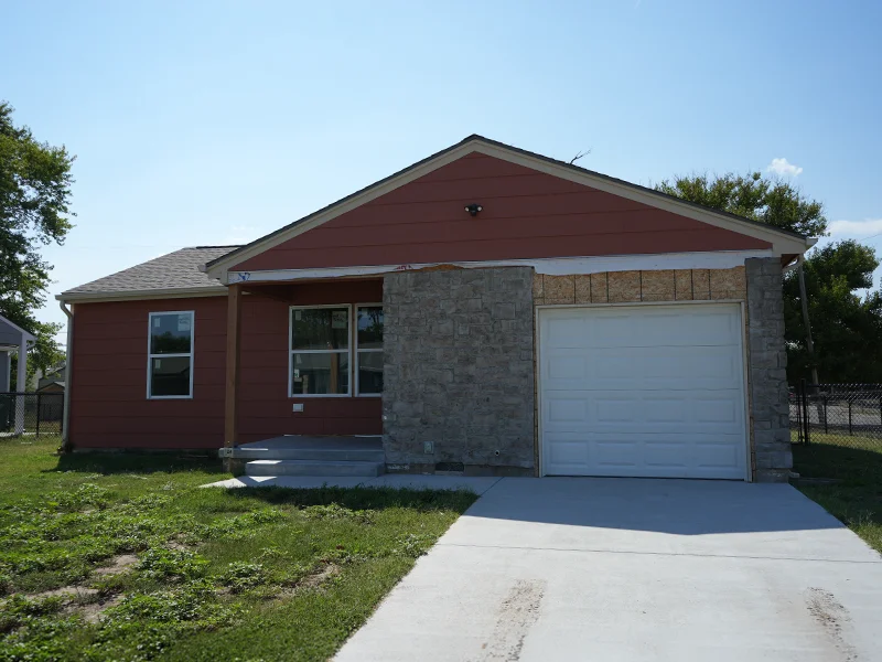 A small, single-story house under construction.
